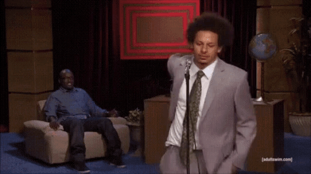 GIF of Eric Andre shooting Hannibal